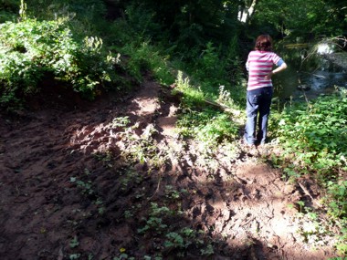 Floods wash away a footpath at Cuddling Hole, near Appleby in  2010
