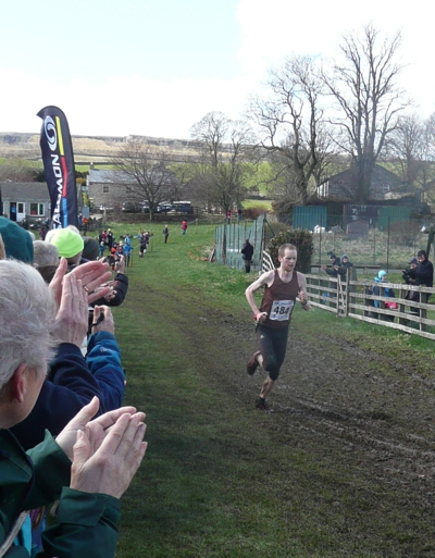 Joe Symonds crosses the finish line