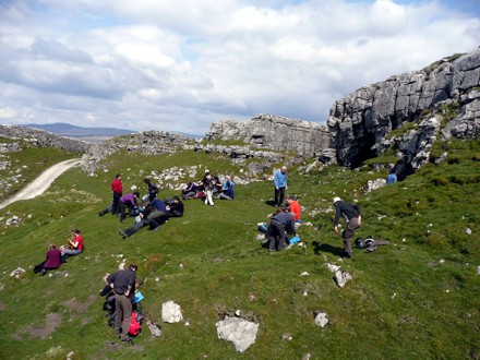 Walkers rest at Jubilee Cave on "A Taste of A Dales High Way"